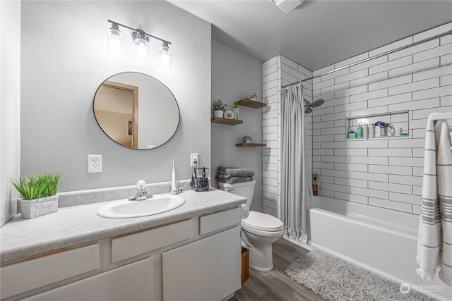 full bathroom with toilet, vanity, shower / bath combination with curtain, and hardwood / wood-style flooring