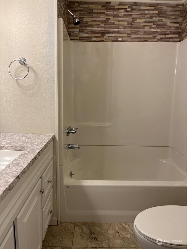 full bathroom featuring vanity, toilet, and shower / bath combination