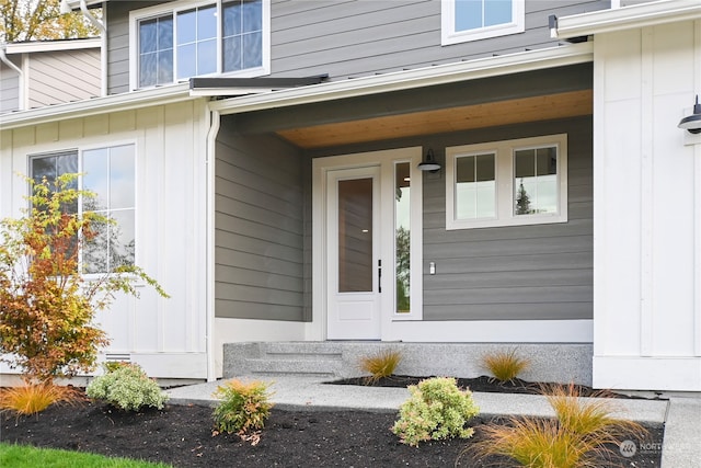 doorway to property with a porch