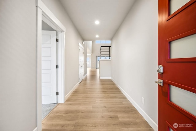 hallway featuring light wood-type flooring