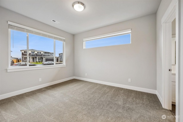 unfurnished bedroom with carpet floors