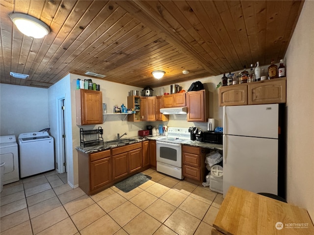 kitchen with white appliances, washer and dryer, wood ceiling, light tile floors, and sink