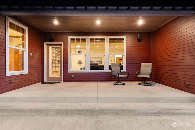 property entrance with a patio