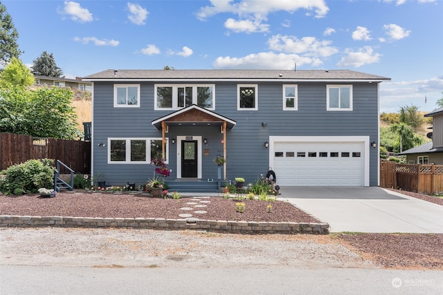 front of property with a garage