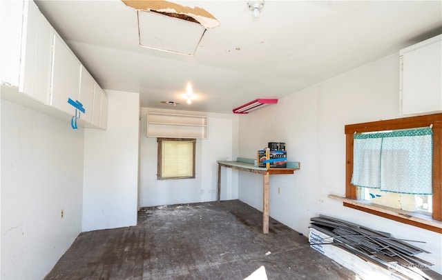 kitchen featuring white cabinets