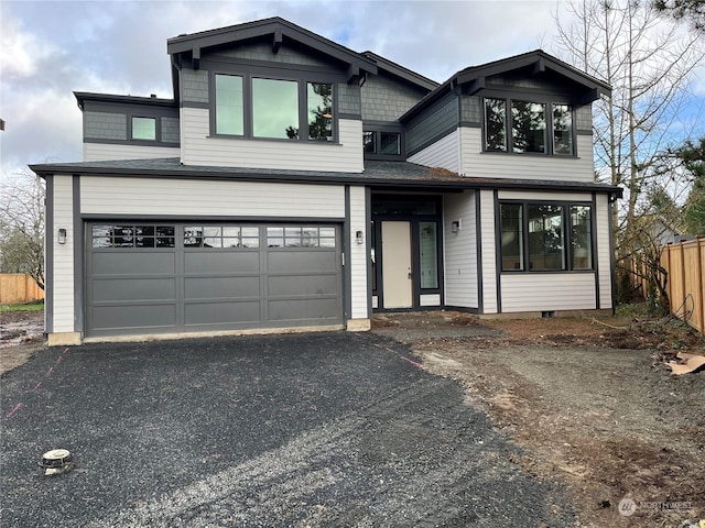 view of front of property with a garage