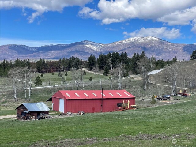 property view of mountains with a rural view