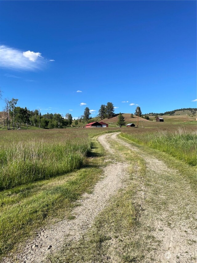 view of road featuring a rural view