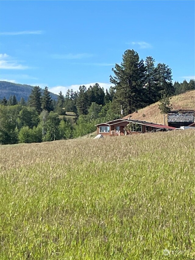 exterior space with a rural view