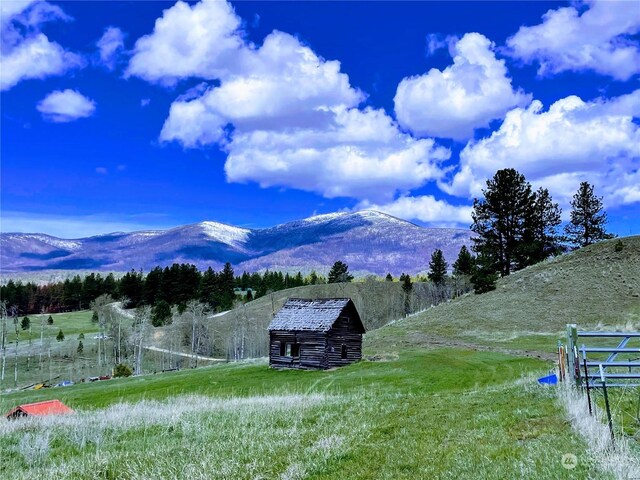 property view of mountains featuring a rural view