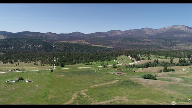 view of mountain feature with a rural view