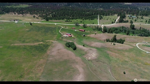 birds eye view of property featuring a rural view