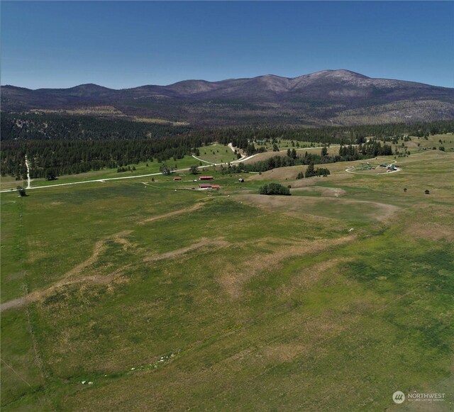 view of mountain feature with a rural view