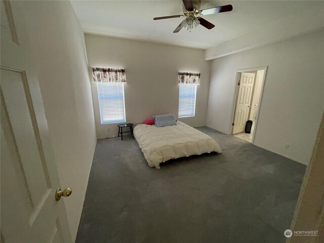 bedroom featuring light carpet and ceiling fan