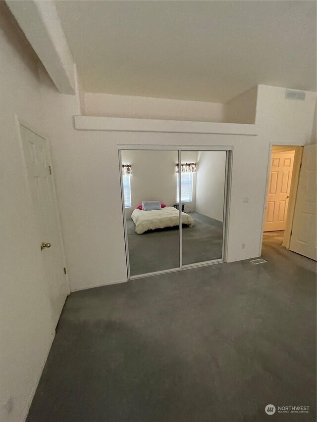 unfurnished bedroom featuring a closet