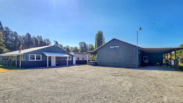 view of front facade with a carport