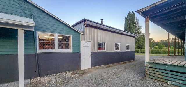 view of property exterior at dusk