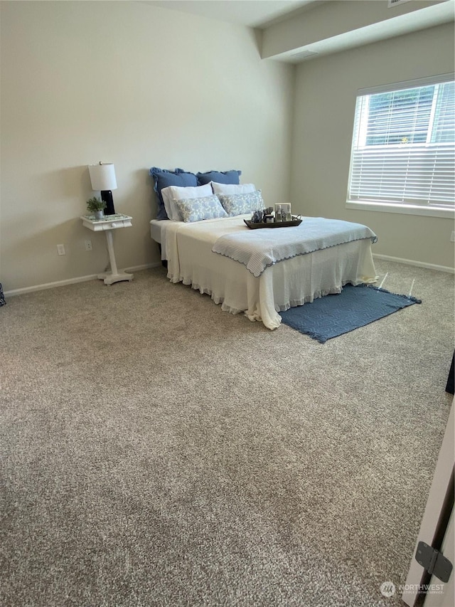 bedroom featuring carpet flooring