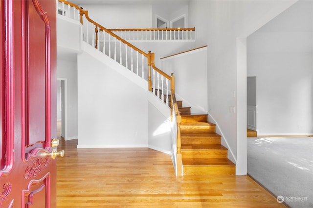 6613 Villa Madera Dr SW, Lakewood, WA 98499 - foyer with a towering ceiling and light hardwood / wood-style flooring