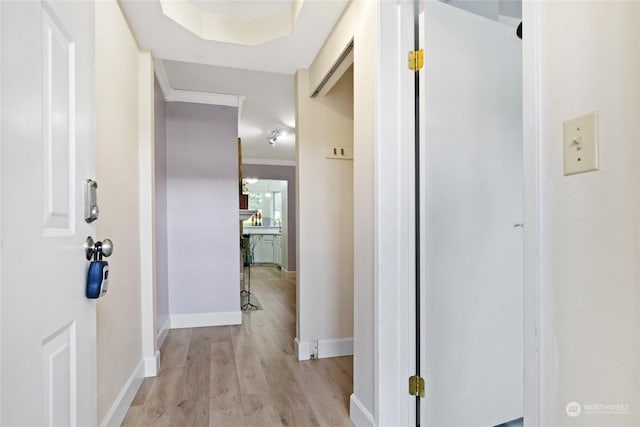 corridor featuring light hardwood / wood-style flooring