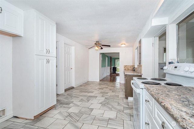 kitchen with ceiling fan, white cabinetry, and white electric stove