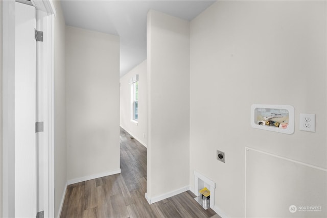 laundry area featuring light hardwood / wood-style floors, hookup for a washing machine, and electric dryer hookup