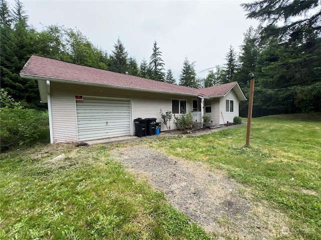 525 Meade Hill Rd, Glenoma, WA 98336 - ranch-style house with an attached garage, gravel driveway, and a front yard