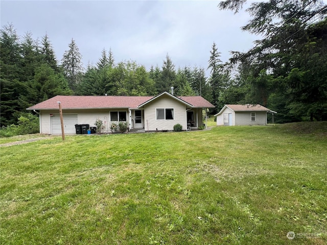 525 Meade Hill Rd, Glenoma, WA 98336 - back of property with an attached garage, a lawn, and driveway