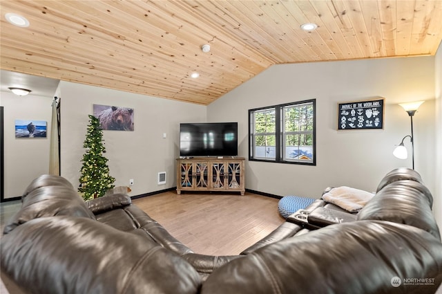 living room with lofted ceiling, light hardwood / wood-style floors, and wood ceiling