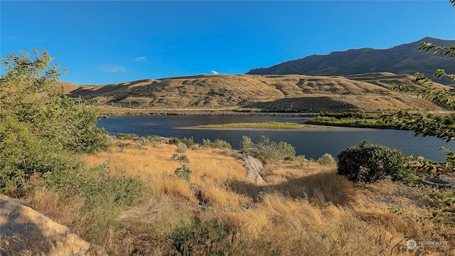 mountain view featuring a water view