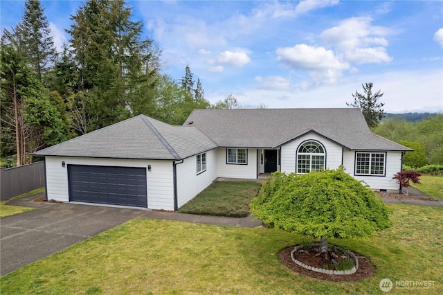 ranch-style home with a garage, a front lawn, fence, roof with shingles, and driveway
