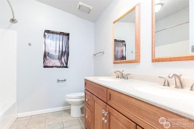 full bathroom featuring tile patterned flooring, double sink vanity, toilet, and tub / shower combination