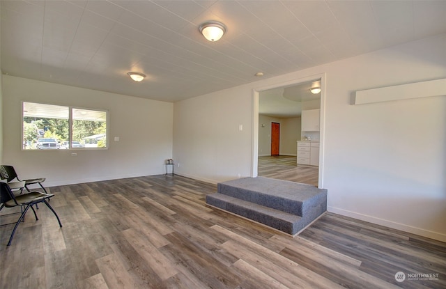 unfurnished room featuring hardwood / wood-style floors