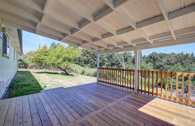 deck featuring a lawn