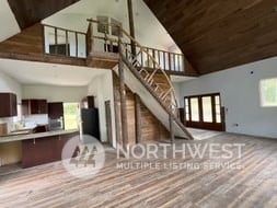 interior space featuring high vaulted ceiling, french doors, and wooden ceiling