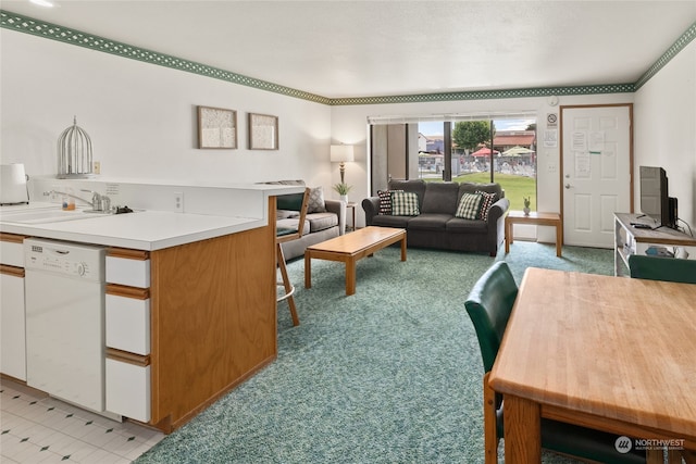 living room with light carpet, crown molding, and sink