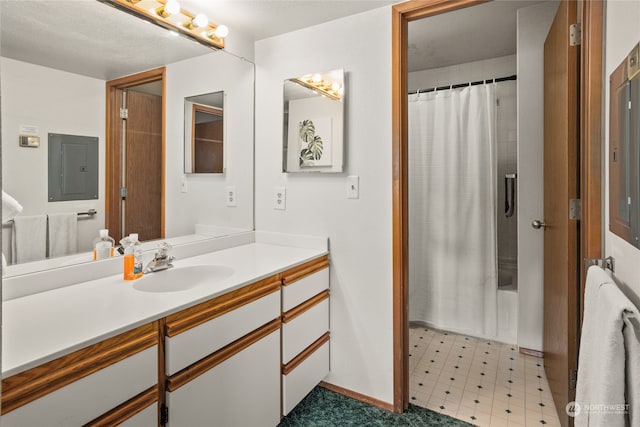 bathroom with vanity, shower / tub combo, tile patterned floors, and electric panel