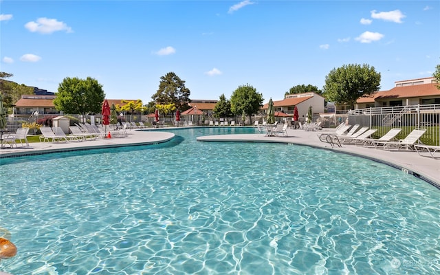 view of swimming pool featuring a patio