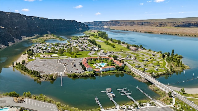 bird's eye view featuring a water and mountain view