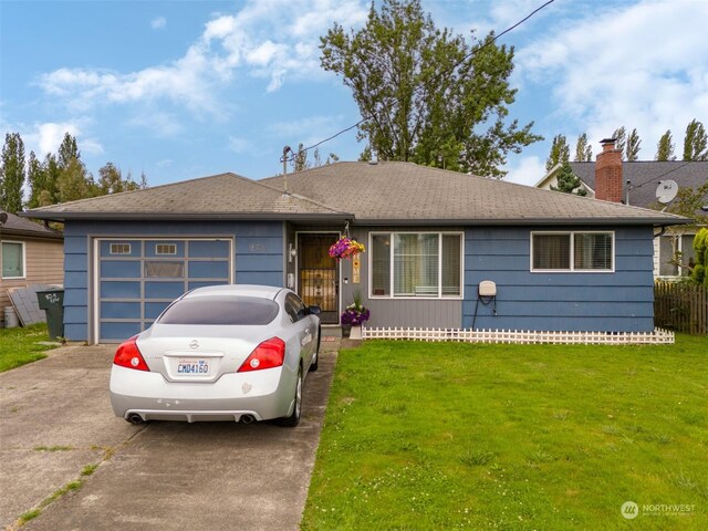 ranch-style house with a garage and a front yard