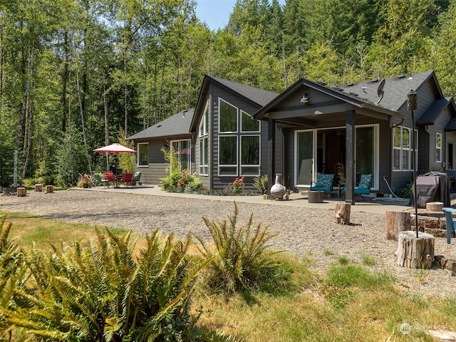 back of house with a patio area