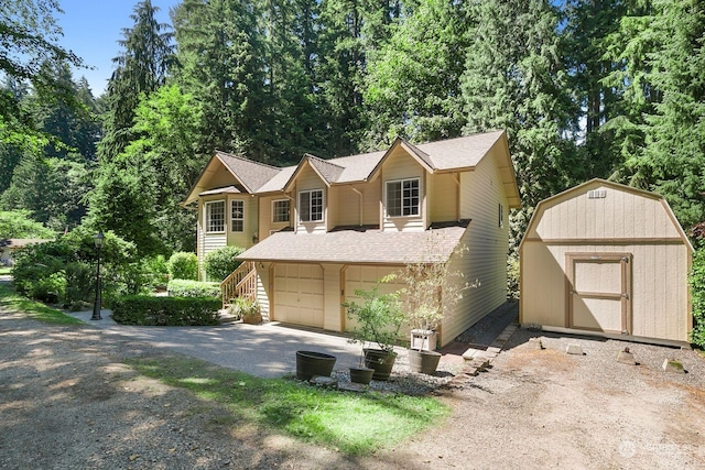 view of front of house with a shed