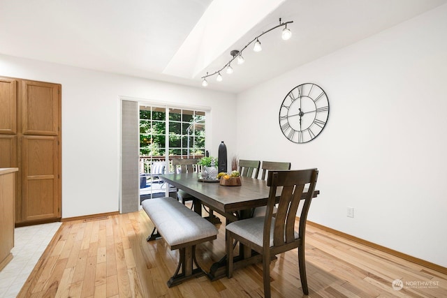 dining room with light hardwood / wood-style floors