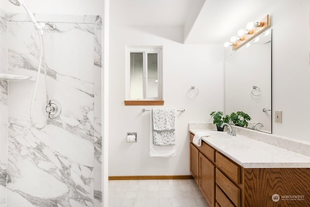 bathroom with vanity and walk in shower