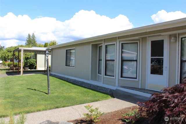 view of property exterior featuring a yard