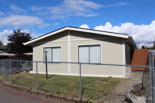 view of home's exterior featuring a lawn