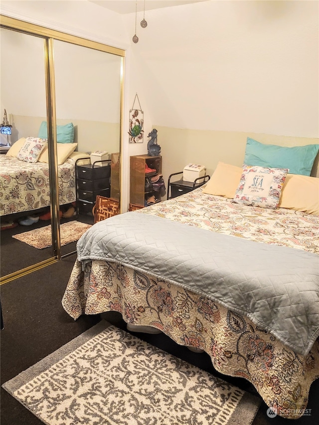 bedroom featuring a closet and carpet