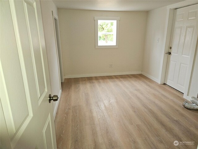 unfurnished bedroom featuring light hardwood / wood-style flooring