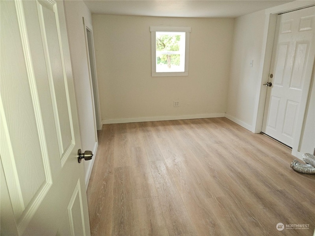 307 E Roanoke St, Centralia, WA 98531 - unfurnished bedroom with light wood-style floors and baseboards