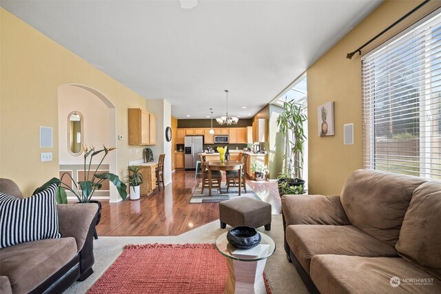 1735 SW 346th Pl, Federal Way, WA 98023 - living room with dark hardwood / wood-style floors and a notable chandelier